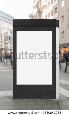 Mockup of the blank white street city outdoor advertising vertical billboard in black frame on sidewalk