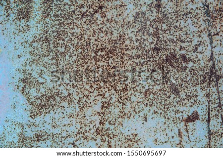 Abstract background. Rust on the blue painted metal surface. Background, structure.