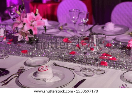 festive luxury table setting with flowers. Catering banquet. table decor for celebration wedding , anniversary, christmas , new year. table setting restaurant. selective focus