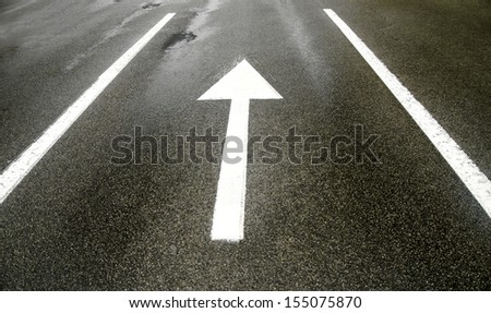 Road lanes with arrow marking in the street