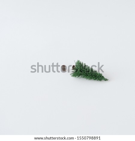 Creative Christmas tree concept with bright background. Minimal winter flat lay holiday concept.
