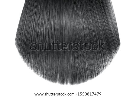 Black hair close-up on white background, isolated. Carefully trimmed tips