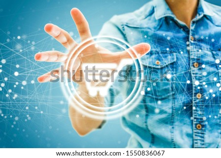 Businessman on blurred background using digital shopping icons with connections