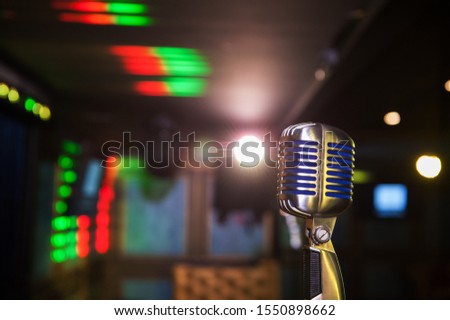 Close-up of retro microphone at concert