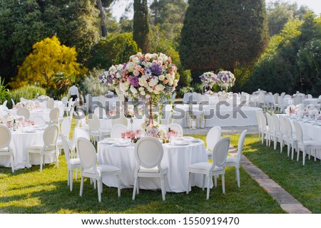 Decorated stylish tables for wedding celebration