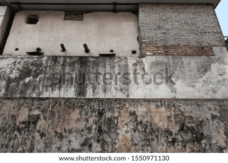 Hipster grunge vintage concrete wall with paint and water  mark