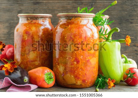 Canned eggplant and bell peppers in tomato sauce canned in glass jars