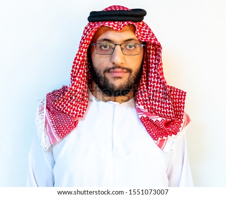 Arabic man standing alone with white background