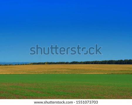 Dramatic autumn farm meadow landscape background