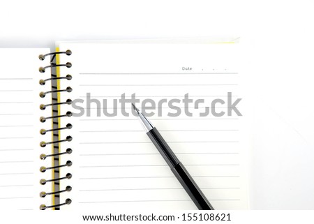 Still-life of pencil with a notebook