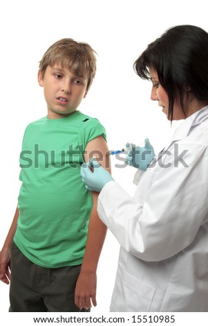 A child receives a vaccination with some trepidation.