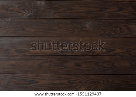 texture of charred textured wooden table in detail Royalty-Free Stock Photo #1551129437