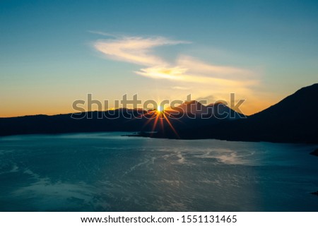 view of San Juan La Laguna on Lake Atitlan on sunrise