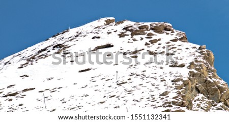 View of a mountain peak with a dusting of snow, Kitzsteinhorn summit