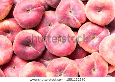 Background of fig peaches. Harvest of Fresh Peaches