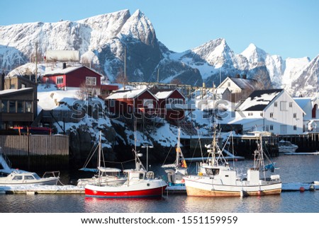 Little bay in winter on Lofoten islands. ships and rorbu. Norway

