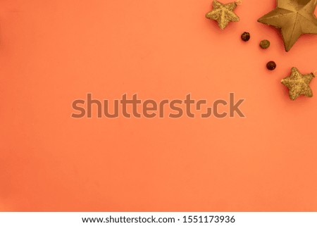 Creative Composition Useful for Christmas and New Year Greeting Card Created Using Gold Decorative Stars. Copy Space on The Left