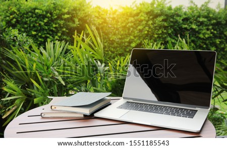 Object Laptop and Book on wooden desk for work or education