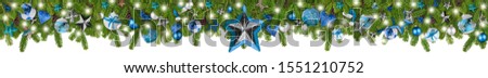 christmas garland super wide panorama banner with fir branches blue turquoise and wooden silver stars lights and baubles xmas russtic traditional natural tree decoration isolated on white background