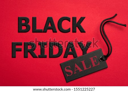 Black Friday sale tag in red background