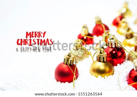 Christmas card, illustration with golden baubles, balls, decorations, ornaments on a silver white background with blurry, blurred, lights (bokeh), soft, neutral, warm colors and Merry Christmas text