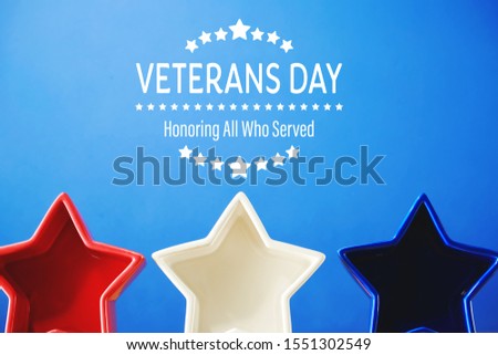 Veterans day message with red white and blue star decorations
