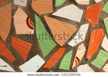 Ceramic colored tiles on concrete