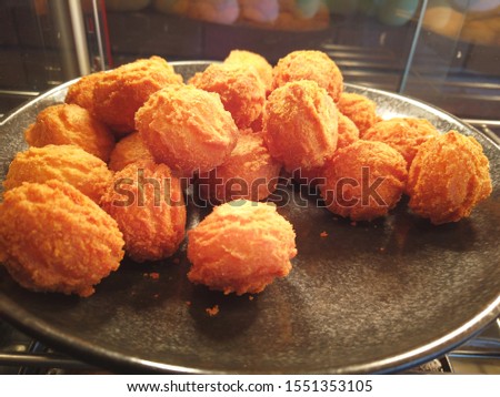 Lots of potato croquettes on a plate