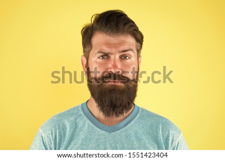 Grow mustache. Growing and maintaining moustache. Man bearded hipster with mustache. Beard and mustache grooming guide. Hipster handsome bearded attractive guy yellow background. Barber shop concept.