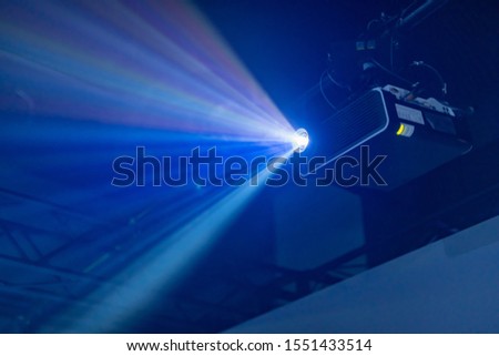 Projector equipment projecting digital images Royalty-Free Stock Photo #1551433514