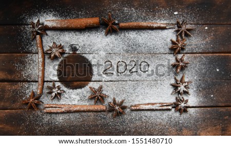 cinnamon stick frame stars star anise icing sugar for Christmas decor