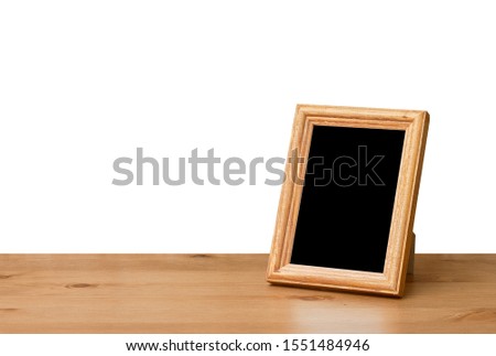photo frame on table, white backgroud, isolated with clipping path.
