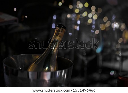 Bottles of champagne soak In an ice bucket.Concept merry christmas and happy new year 2020 