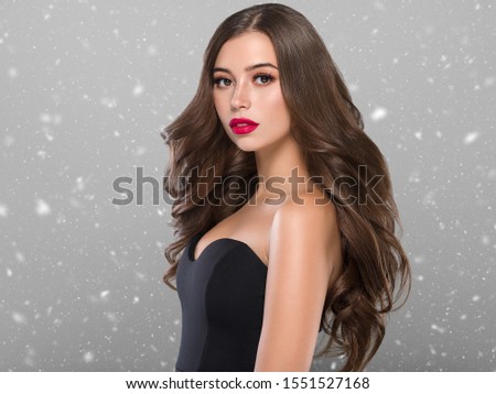 Winter beauty woman skin care beautiful hair snowflakes background
