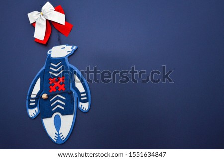 Polar bear cartoon character. A Polar bear in traditional north suit. Vector illustration for Merry Christmas and Happy New Year invitation card.