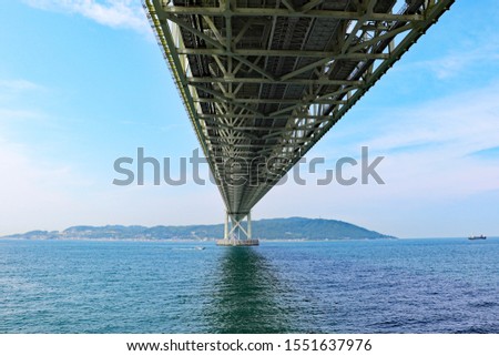 Akashi Kaikyo Bridge viewed from the seaside, Kobe, Japan