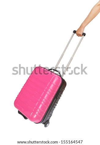 suitcase and hand isolated on white background (with clipping path)