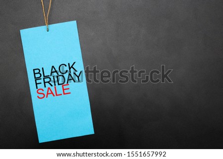 Blue tag with inscription BLACK FRIDAY SALE. Background for masive sales in november, with copy space for your text.