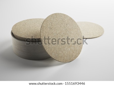Mockup of empty blank beer drink cork coasters in studio environment on bright white background