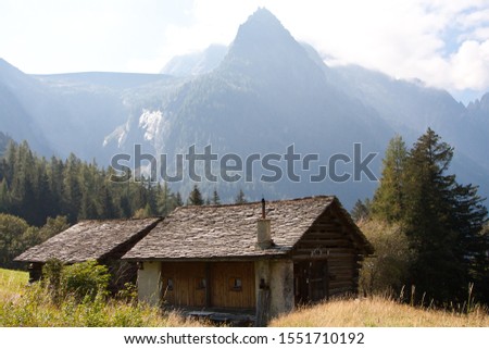 mountain Landscape with old houses in Bregaglia, Switzerland in autumn