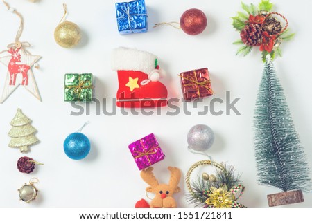 Christmas decorations on a light background. Space for text. New Year's background. Toned image. Christmas background.