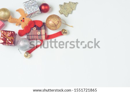 Christmas decorations on a light background. Space for text. New Year's background. Toned image. Christmas background.