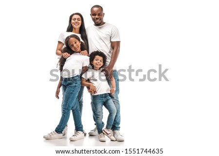 happy african american parents with daughter and son smiling at camera while standing on white background