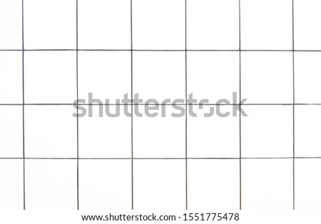Grid white square wall tiles,texture background.