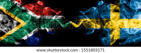 South Africa vs Sweden, Swedish smoky mystic flags placed side by side. Thick colored silky abstract smoke flags concept