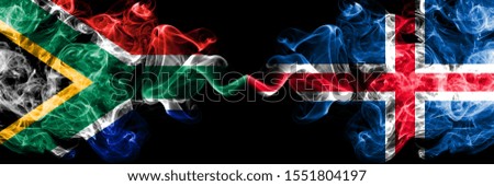 South Africa vs Iceland, Icelandic smoky mystic flags placed side by side. Thick colored silky abstract smoke flags concept