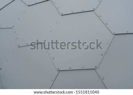Cosmic texture, metal hexagonal sheets of metal connected in a single, honeycomb, spacecraft wall