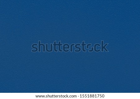 Color of the year 2020 classic blue. Fashionable classic blue pantone color of spring-summer 2020 season. Texture of colored porous rubber. Modern luxury background or mock up with space for text