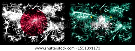 Japan, Japanese vs Macau, China New Year celebration sparkling fireworks flags concept background. Combination of two abstract states flags.
