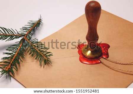 Seal, sealing wax and vintage envelope. Vintage holiday background.